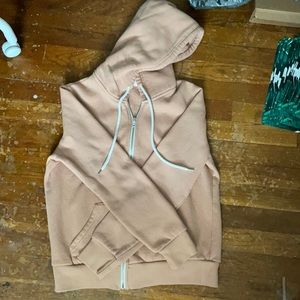 tan/peach zip up